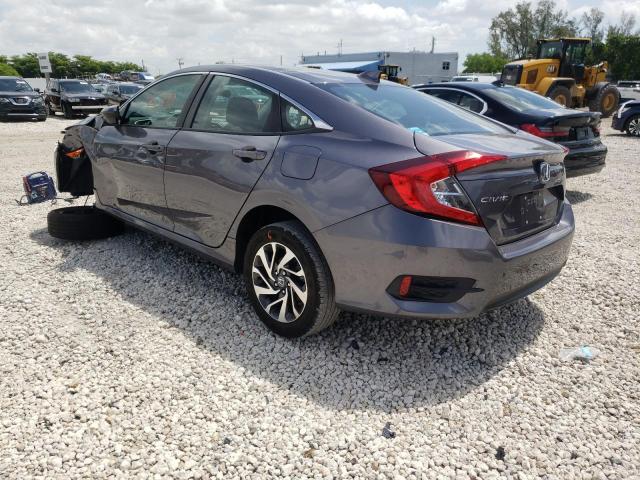 Photo 3 from auction – 2018 HONDA CIVIC EX with VIN 19XFC2F78JE036500