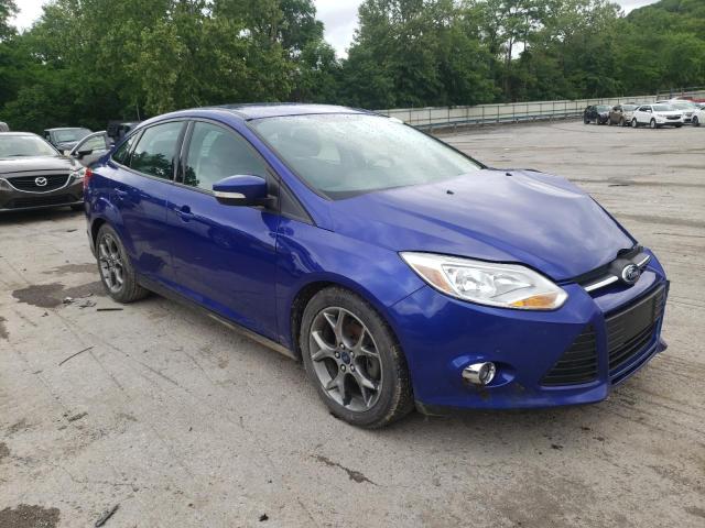 FORD FOCUS SE 2014 with VIN 1FADP3F29EL302244 - Photo from auction