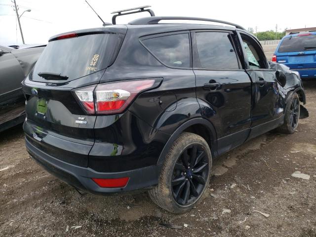 Photo 4 from auction – 2017 FORD ESCAPE SE with VIN 1FMCU9GD3HUD47739