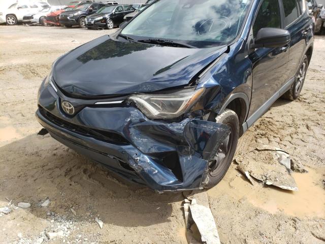 Photo 9 from auction – 2018 TOYOTA RAV4 LE with VIN 2T3ZFREV2JW463656