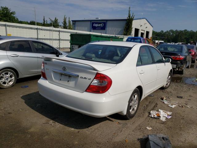 Photo 4 from auction – 2003 TOYOTA CAMRY LE with VIN 4T1BE30K83U156857