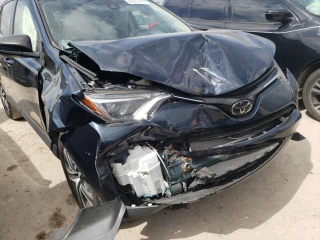 Photo 9 from auction – 2018 TOYOTA RAV4 LE with VIN JTMZFREV9JJ167953