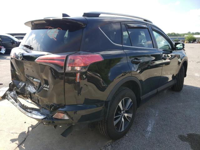 Photo 4 from auction – 2017 TOYOTA RAV4 XLE with VIN 2T3RFREV5HW611034