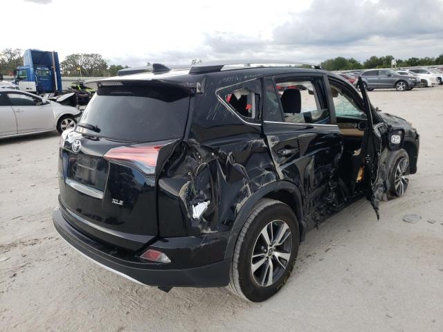 Photo 4 from auction – 2016 TOYOTA RAV4 XLE with VIN 2T3WFREV4GW245925