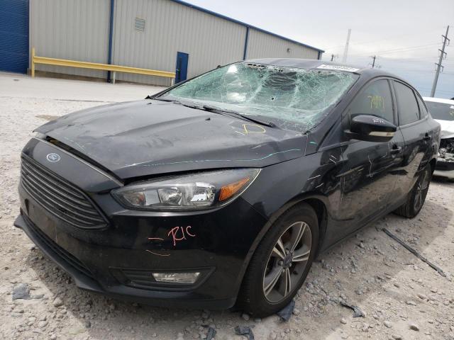 Photo 2 from auction – 2017 FORD FOCUS SE with VIN 1FADP3FE8HL303173