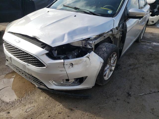 Photo 9 from auction – 2015 FORD FOCUS SE with VIN 1FADP3F28FL213931