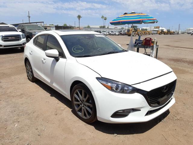 MAZDA 3 TOURING 2018 with VIN 3MZBN1V38JM203751 - Photo from auction