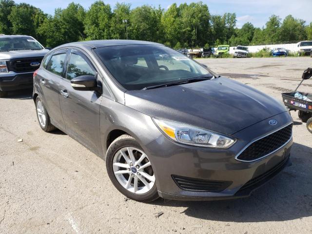 FORD FOCUS SE 2015 with VIN 1FADP3K22FL217771 - Photo from auction