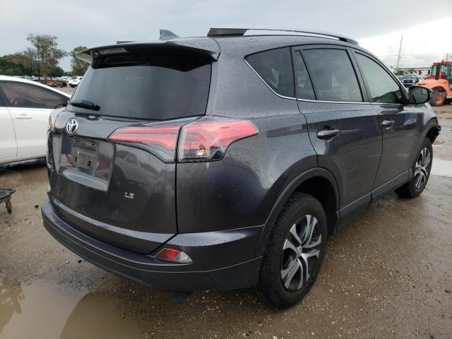 Photo 4 from auction – 2017 TOYOTA RAV4 LE with VIN JTMZFREV7HJ111228