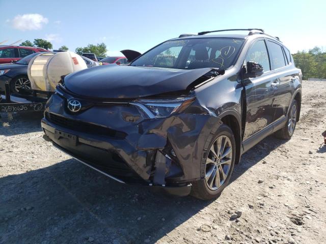 Photo 2 from auction – 2018 TOYOTA RAV4 LIMIT with VIN JTMDFREV2JJ246343