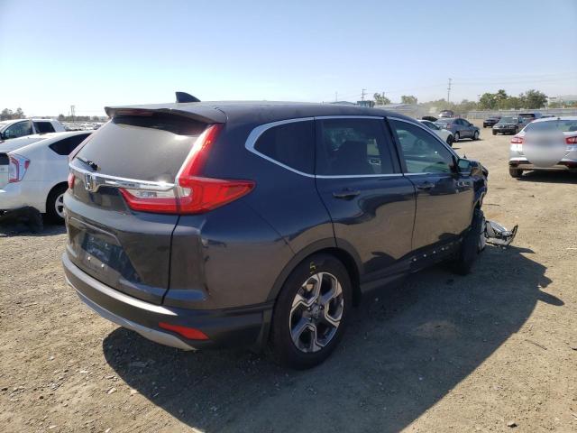 Photo 4 from auction – 2018 HONDA CR-V EXL with VIN 7FARW1H83JE049366