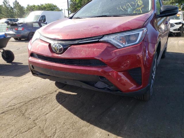 Photo 9 from auction – 2018 TOYOTA RAV4 LE with VIN 2T3ZFREV7JW502564
