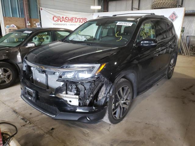 Photo 2 from auction – 2017 HONDA PILOT TOUR with VIN 5FNYF6H97HB064279