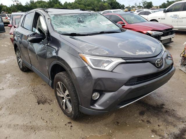 TOYOTA RAV4 XLE 2017 with VIN JTMWFREV6HJ717509 - Photo from auction