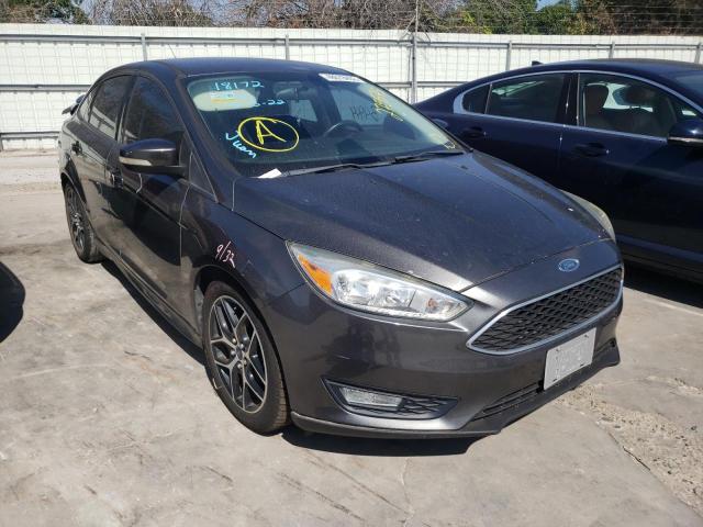 FORD FOCUS SE 2016 with VIN 1FADP3F21GL275575 - Photo from auction