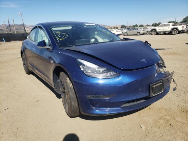 TESLA MODEL 3 2018 with VIN 5YJ3E1EA9JF005562 - Photo from auction