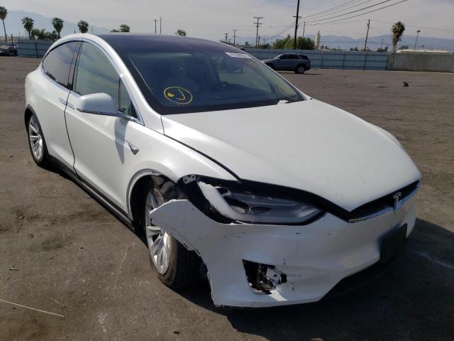 TESLA MODEL X 2017 with VIN 5YJXCBE21HF066338 - Photo from auction