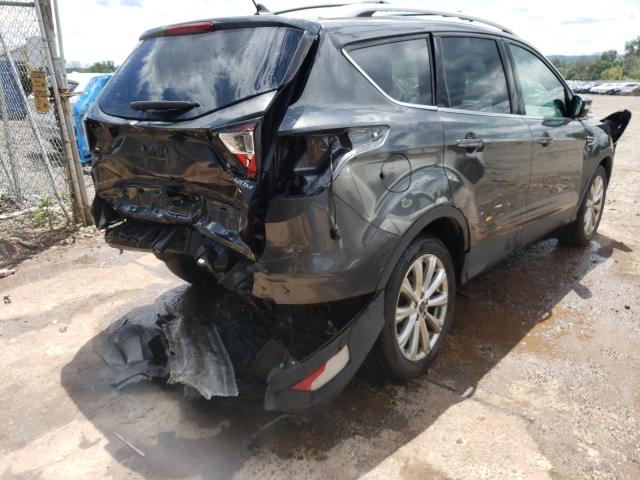 Photo 4 from auction – 2018 FORD ESCAPE TIT with VIN 1FMCU9J96JUD46787