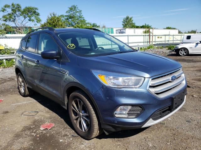 FORD ESCAPE SE 2018 with VIN 1FMCU9GD2JUB94986 - Photo from auction
