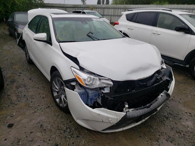 TOYOTA CAMRY LE 2017 with VIN 4T1BF1FK7HU693171 - Photo from auction