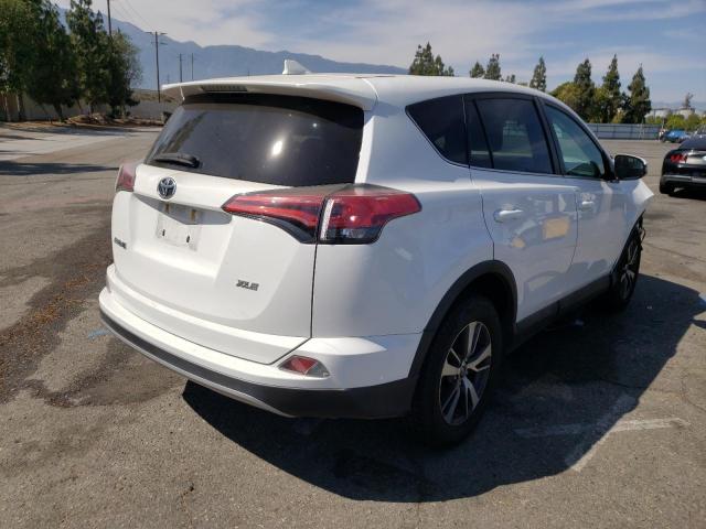 Photo 4 from auction – 2017 TOYOTA RAV4 XLE with VIN 2T3WFREV7HW400274