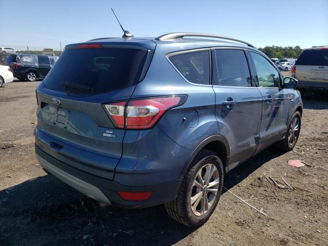 Photo 4 from auction – 2018 FORD ESCAPE SE with VIN 1FMCU9GD2JUB94986