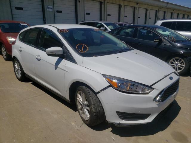 FORD FOCUS SE 2017 with VIN 1FADP3K29HL336663 - Photo from auction