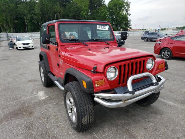 JEEP WRANGLER 2002 with VIN 1J4FA39S72P751565 - Photo from auction