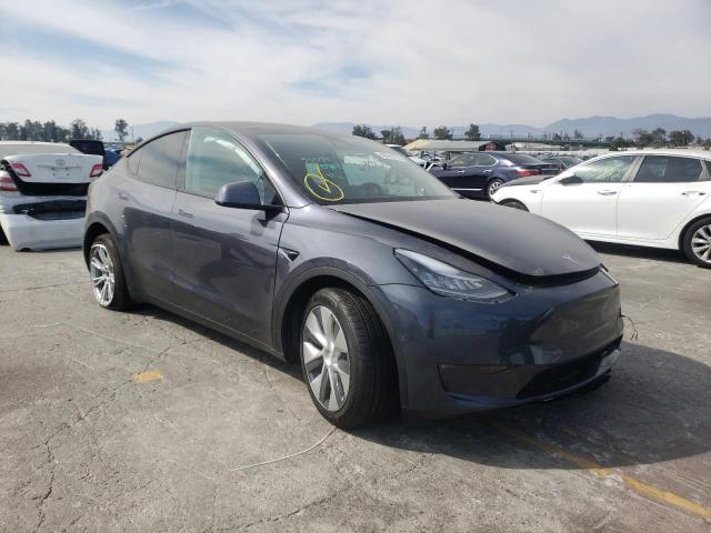 TESLA MODEL Y 2022 with VIN 7SAYGDEE3NF318085 - Photo from auction
