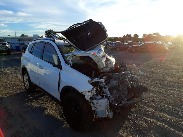 TOYOTA RAV4 LE 2014 with VIN JTMZFREV6EJ005803 - Photo from auction