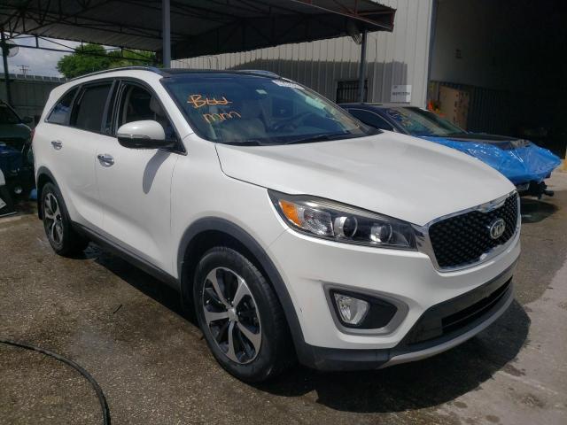 KIA SORENTO EX 2016 with VIN 5XYPH4A14GG098654 - Photo from auction