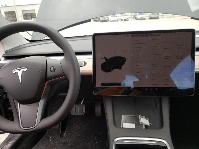 Photo 9 from auction – 2022 TESLA MODEL 3 with VIN 5YJ3E1EB7NF186966