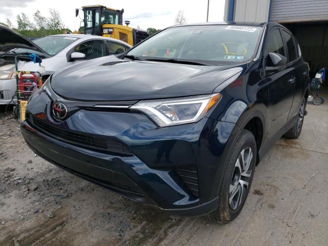 Photo 2 from auction – 2018 TOYOTA RAV4 LE with VIN JTMBFREV9JJ212116