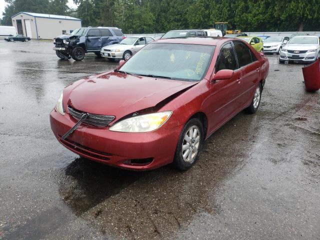Photo 2 from auction – 2002 TOYOTA CAMRY LE with VIN JTDBE32K720067563
