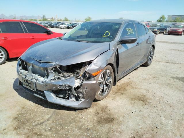 Photo 2 from auction – 2018 HONDA CIVIC EX with VIN JHMFC1F38JX005995