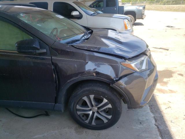 Photo 9 from auction – 2018 TOYOTA RAV4 LE with VIN JTMZFREV3JJ156964