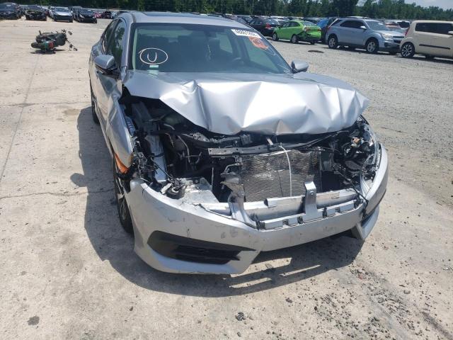 HONDA CIVIC EX 2018 with VIN 2HGFC2F76JH524883 - Photo from auction