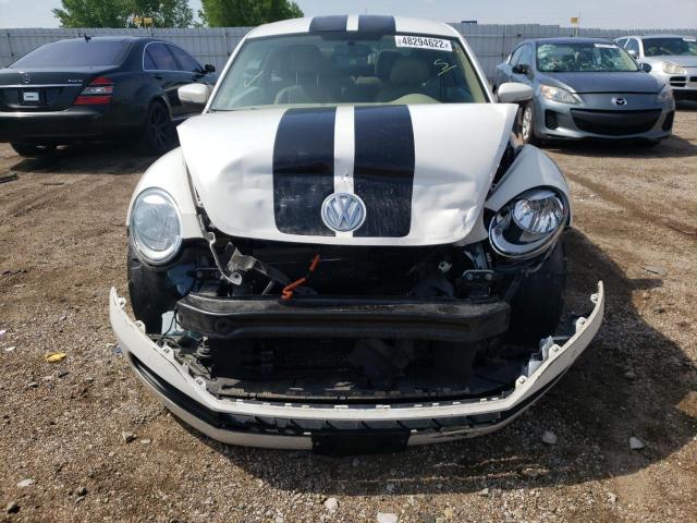 Photo 7 from auction – 2013 VOLKSWAGEN BEETLE with VIN 3VWJX7AT3DM607818