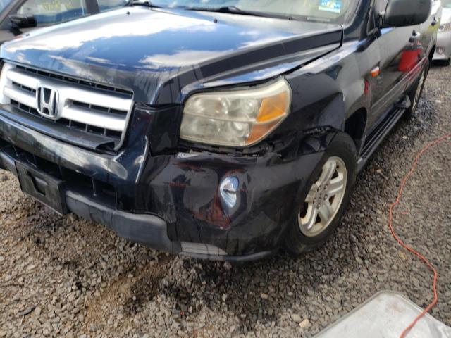 Photo 9 from auction – 2006 HONDA PILOT LX with VIN 2HKYF18186H552152
