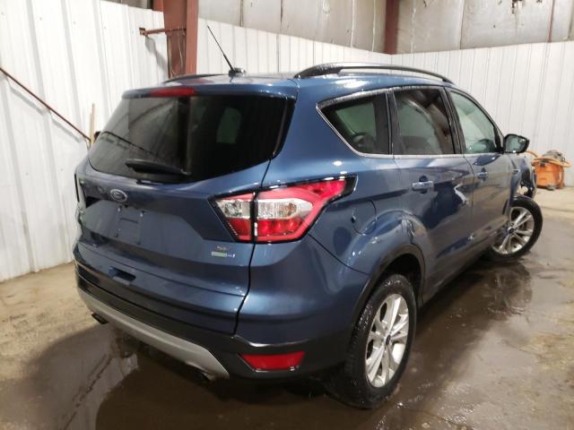Photo 4 from auction – 2018 FORD ESCAPE SE with VIN 1FMCU9GD5JUC61919