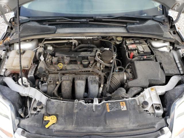 Photo 7 from auction – 2014 FORD FOCUS SE with VIN 1FADP3F28EL299496