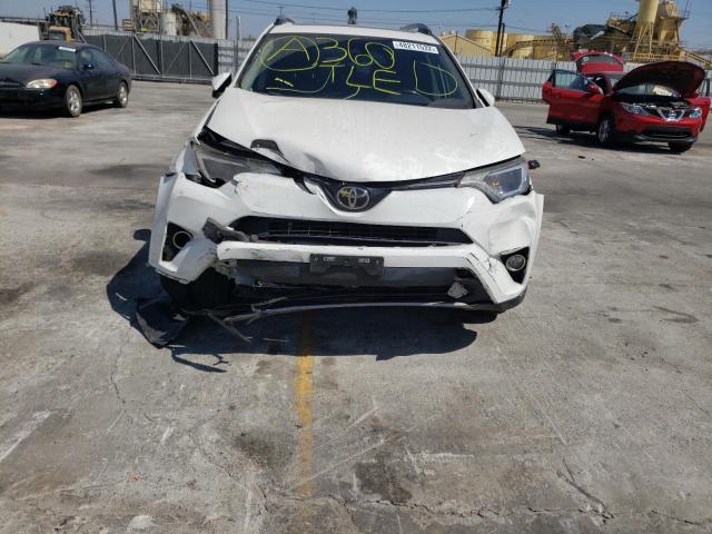 Photo 9 from auction – 2017 TOYOTA RAV4 XLE with VIN JTMWFREV7HJ113936