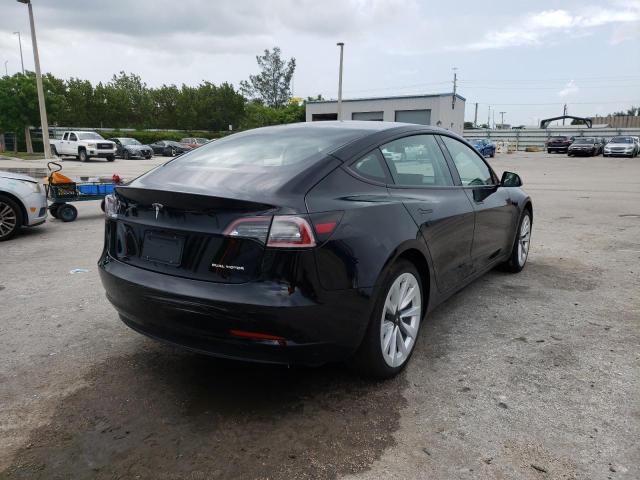 Photo 4 from auction – 2022 TESLA MODEL 3 with VIN 5YJ3E1EB7NF186966