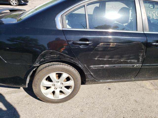 Photo 9 from auction – 2008 KIA OPTIMA LX with VIN KNAGE124385205832