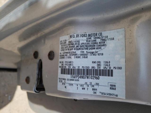 Photo 10 from auction – 2005 FORD FOCUS ZX4 with VIN 1FAFP34N65W183508