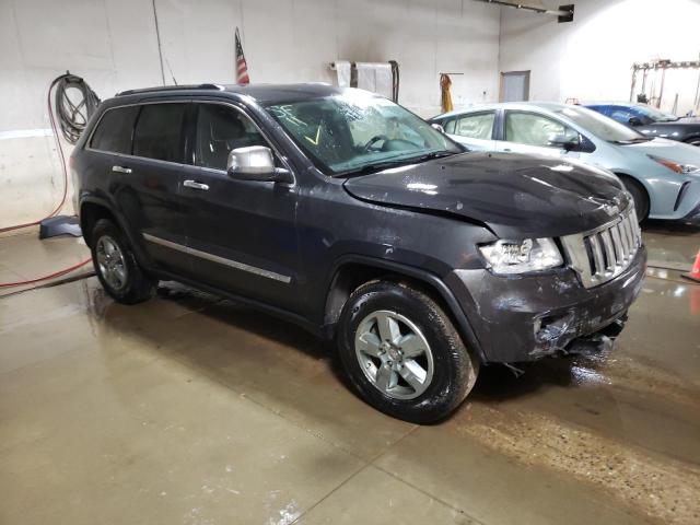 JEEP GRAND CHER 2011 with VIN 1J4RR4GGXBC519091 - Photo from auction
