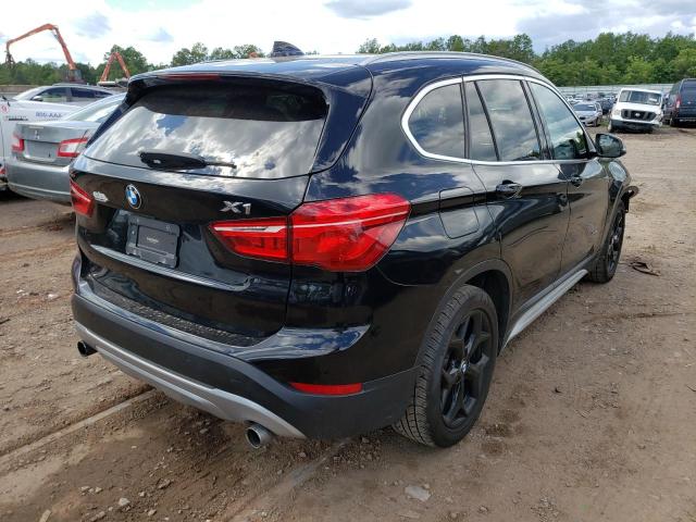 Photo 4 from auction – 2017 BMW X1 XDRIVE2 with VIN WBXHT3Z31H4A54846