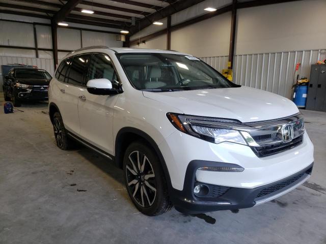 HONDA PILOT TOUR 2022 with VIN 5FNYF6H62NB021762 - Photo from auction