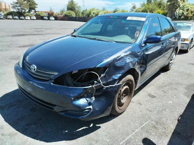Photo 2 from auction – 2002 TOYOTA CAMRY LE with VIN JTDBE32K520042810