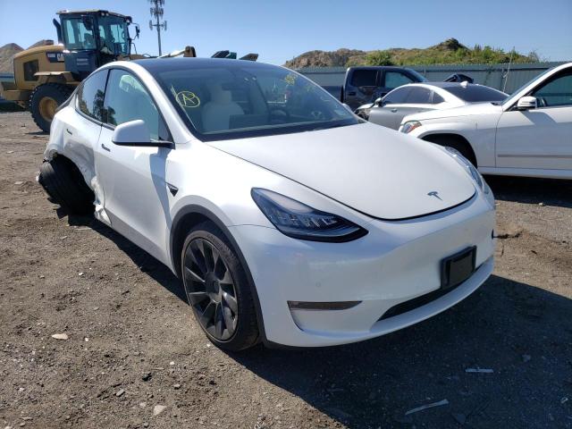 TESLA MODEL Y 2021 with VIN 5YJYGDEE5MF144550 - Photo from auction